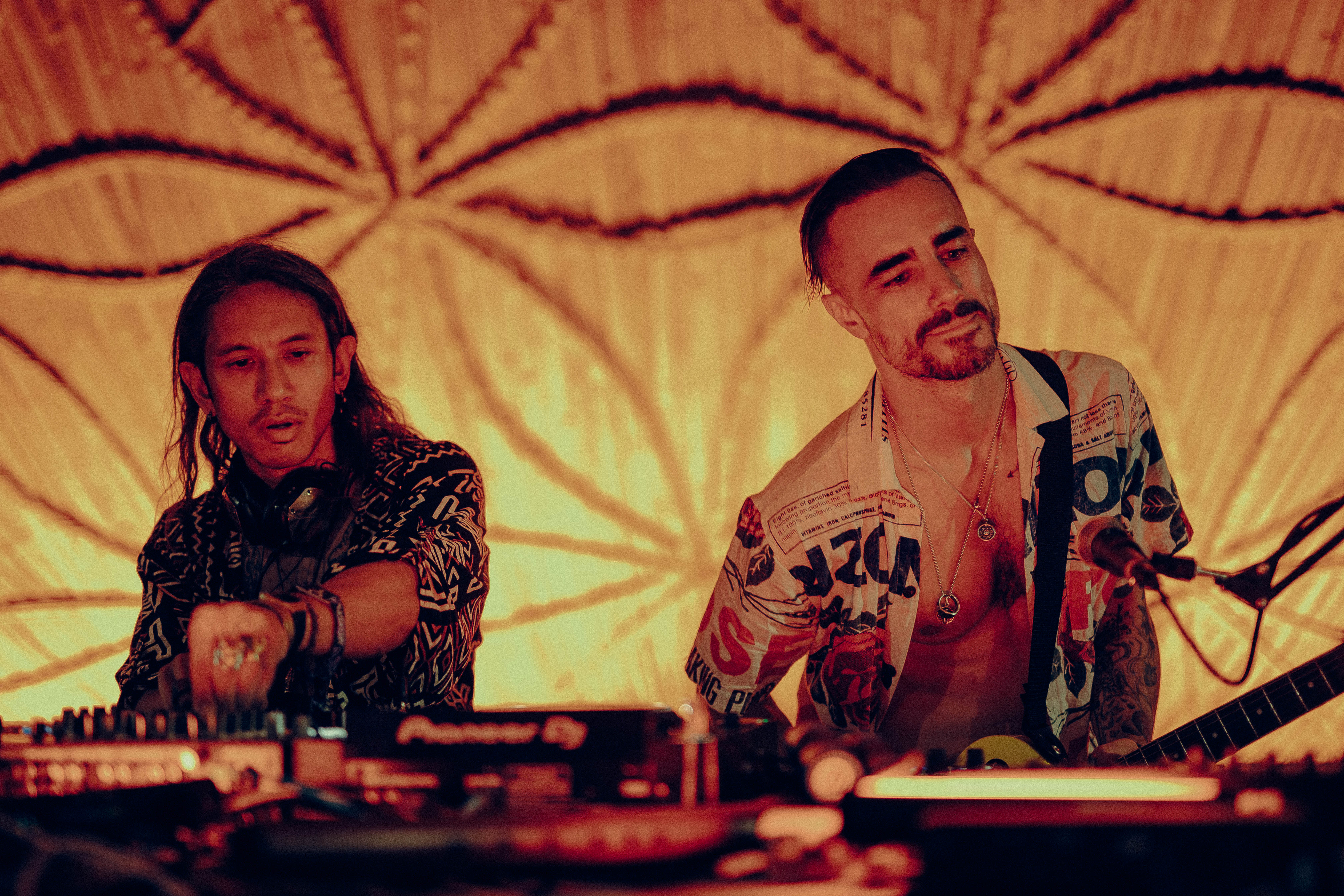 JAGWOLF duo photographed in golden hour light at Envision Festival 2026