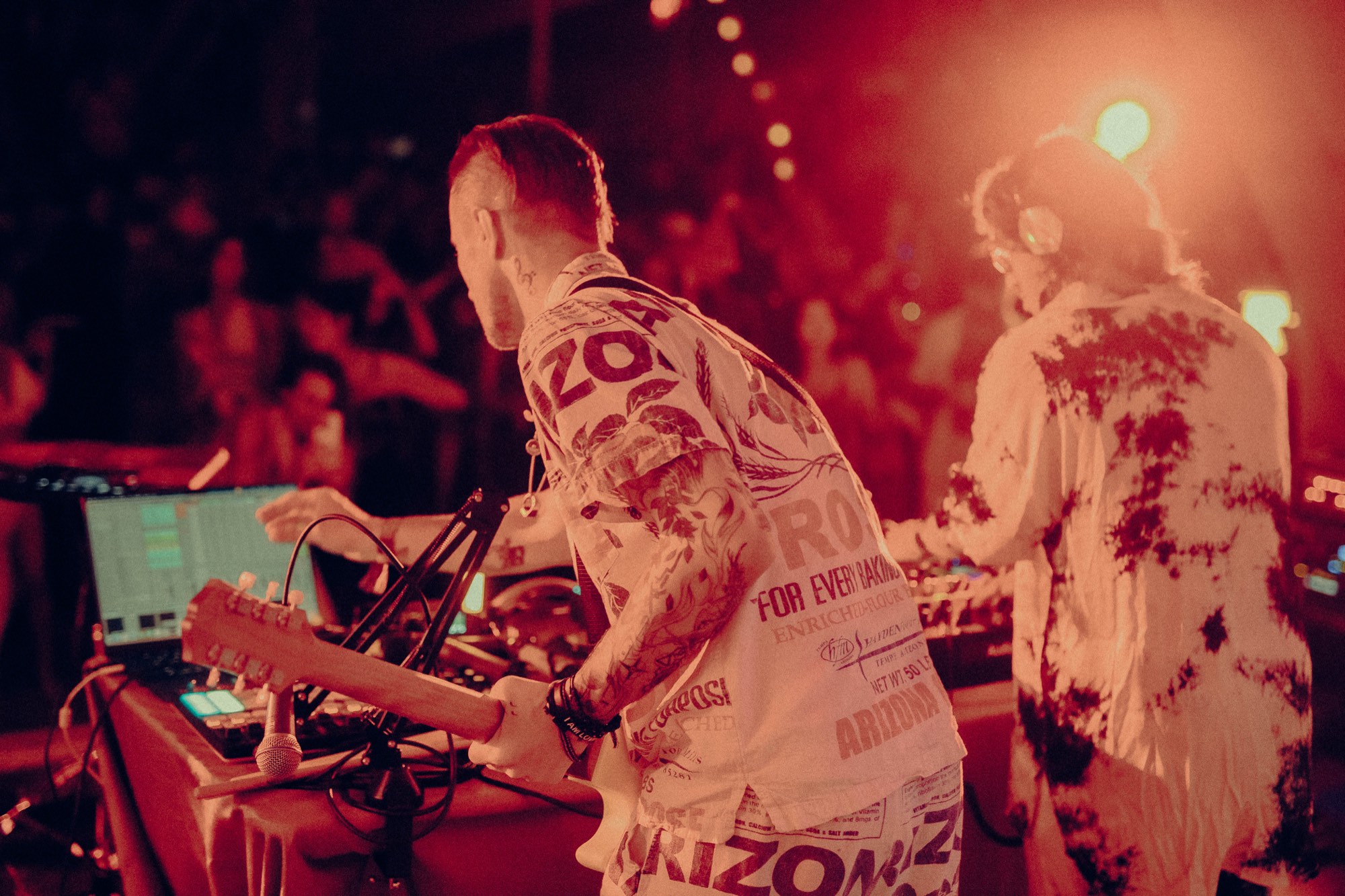 Nova Wolf on guitar beside Shalman on the decks at Medicine Festival 2026
